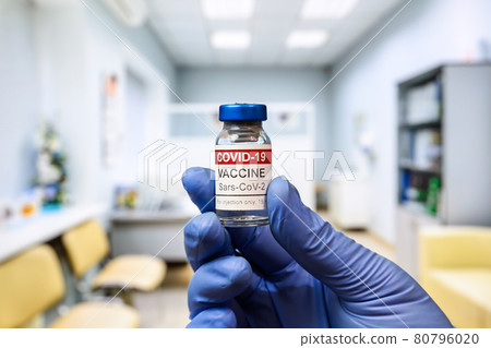 COVID-19 vaccine vial in doctor hand in clinic COVID-19 vaccine vial in doctor hand in clinic 80796020