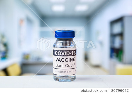 COVID-19 vaccine vial in clinic, bottle with corona virus vaccine for injection COVID-19 vaccine vial in clinic, bottle with corona virus vaccine for injection 80796022
