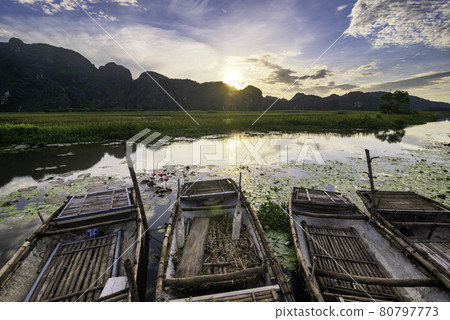 Dawn on Van Long Wetland Nature Reserve in Ninh Binh province, Vietnam 80797773