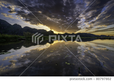 Dawn on Van Long Wetland Nature Reserve in Ninh Binh province, Vietnam 80797802