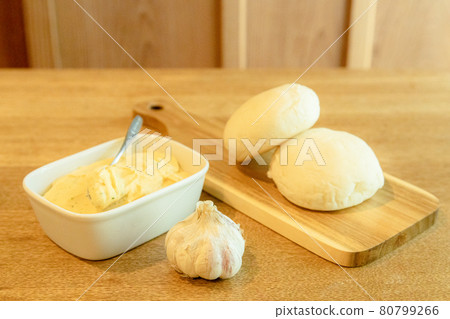Wood table, butter and bread 80799266