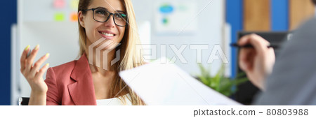 Business partners communicate in office at working table 80803988