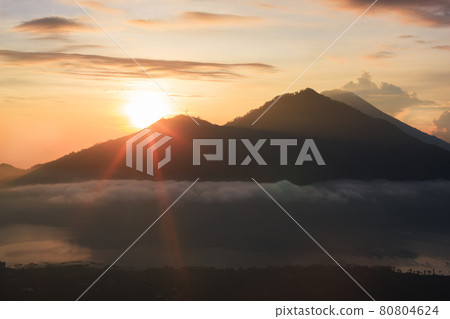 Active volcano and Sunrise from top Mount Batur, Bali, Indonesia Active volcano and Sunrise from top Mount Batur, Bali, Indonesia 80804624