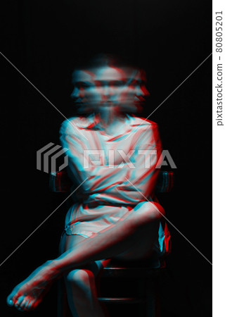portrait of a psych girl with schizophrenia and mental disorders in a white shirt 80805201