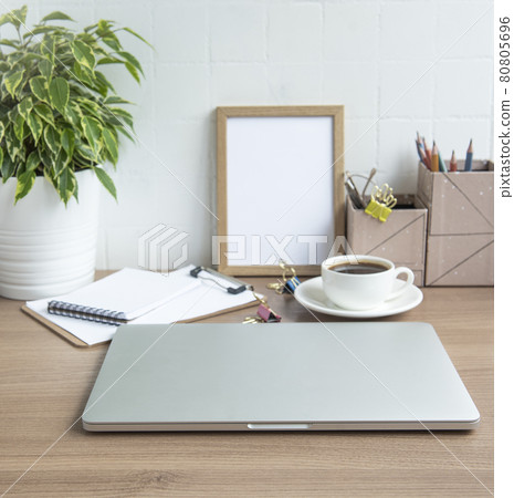 Laptop with office supplies on the table. Laptop with office supplies on the table. 80805696