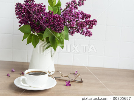 Bouquet of lilac flowers in a vase Bouquet of lilac flowers in a vase 80805697