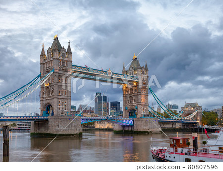 London cityscape with illuminated Tower Bridge over the River Thames London cityscape with illuminated Tower Bridge over the River Thames 80807596