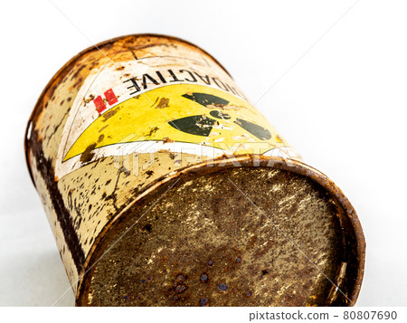 Radiation warning sign on the rusty old cylinder shape container of Radioactive material 80807690
