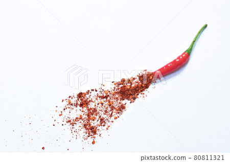 fresh red chili cutting and cayenne pepper spreading on white background 80811321