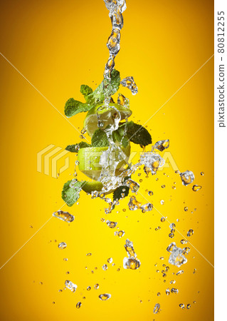 Fresh lime, mint, and ice in a splash. Fresh lime, mint, and ice in a splash. 80812255