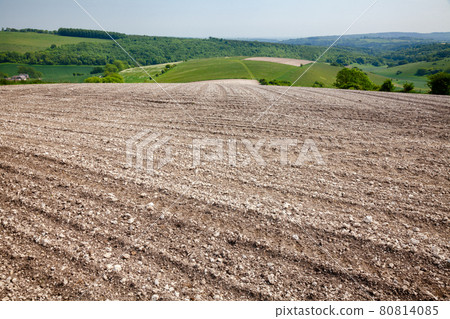 Stony barren soil plowed field Southern England UK 80814085