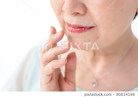 Beauty image of a woman touching her cheeks 80814198