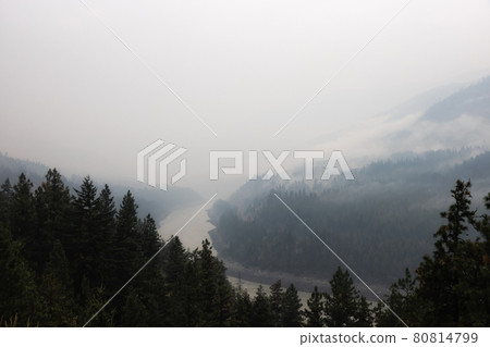 Valley covered by smoke from Forest Wildfire. Valley covered by smoke from Forest Wildfire. 80814799