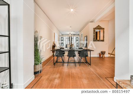 Bright dining room with decorative table and chairs Bright dining room with decorative table and chairs 80815497