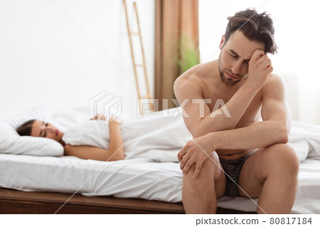 Depressed Guy Having Problems With Erection In Bed Indoors 80817184