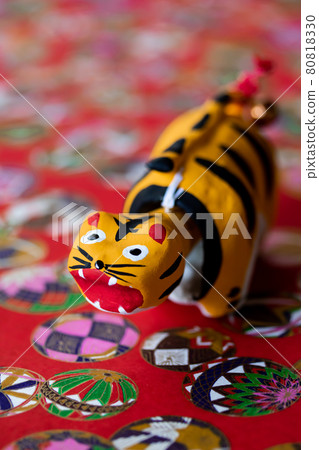 2022 Tiger year, cute tiger with a swinging papier mache 2022 Tiger year, cute tiger with a swinging papier mache 80818330