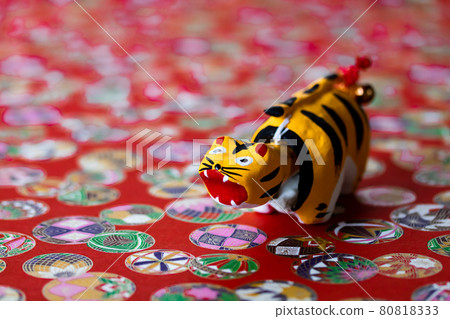 2022 Tiger year, cute tiger with a swinging papier mache 2022 Tiger year, cute tiger with a swinging papier mache 80818333