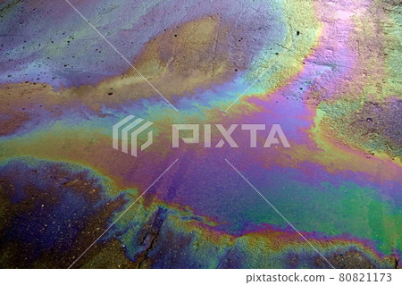 Oil slick that flowed from industrial waste after the rain 80821173