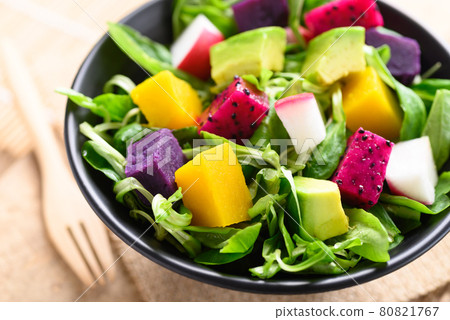 Healthy vegan salad fruits and vegetables with avocado, dragon fruit, radish, pumpkin and corn salad Healthy vegan salad fruits and vegetables with avocado, dragon fruit, radish, pumpkin and corn salad 80821767