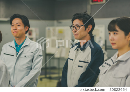 Factory worker listening to the morning assembly Factory worker listening to the morning assembly 80822664