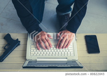 Computers are used by black hackers to steal or attack data on servers. Cybercrime on the internet is a growing problem. Work in a secure facility. 80822843