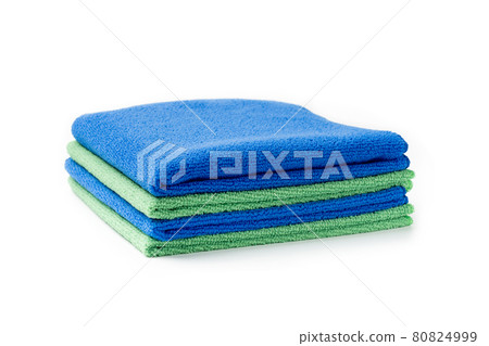 Stack of blue and green towel isolated on white background Stack of blue and green towel isolated on white background 80824999