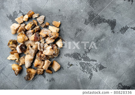 Frozen wild mushrooms, on gray stone background, top view flat lay, with copy space for text Frozen wild mushrooms, on gray stone background, top view flat lay, with copy space for text 80828336