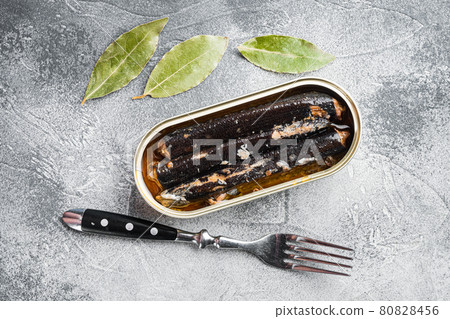 Canned seafood preserved in oil, on gray stone table background, top view flat lay 80828456