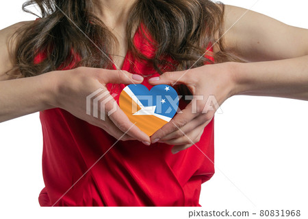 Love Argentine Antarctica. The woman holds a heart in the form of the flag of Argentine Antarctica on her chest. Concept of patriotism Love Argentine Antarctica. The woman holds a heart in the form of the flag of Argentine Antarctica on her chest. Concept of patriotism 80831968