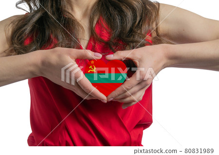 Love Transnistria. The woman holds a heart in the form of the flag of Transnistria on her chest. Concept of patriotism Love Transnistria. The woman holds a heart in the form of the flag of Transnistria on her chest. Concept of patriotism 80831989