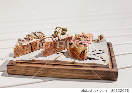 three bruschetta with fish and cream cheese  80832078