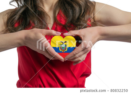 Love Ecuador The woman holds a heart in the form of the flag of Ecuador on her chest. Concept of patriotism Love Ecuador The woman holds a heart in the form of the flag of Ecuador on her chest. Concept of patriotism 80832250