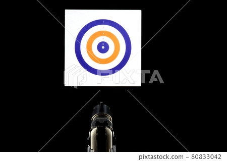 Pistol and Target at a Shooting Range 80833042
