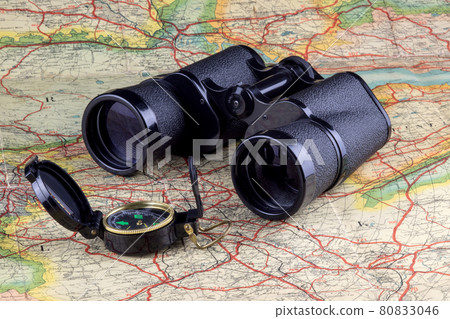 Compass and Binoculars on an Old Route Map Compass and Binoculars on an Old Route Map 80833046