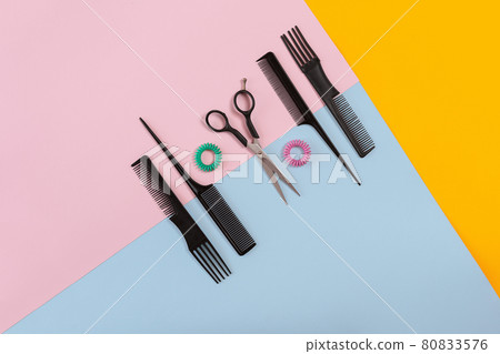Hairdresser tools on a colored background with copy space Hairdresser tools on a colored background with copy space 80833576