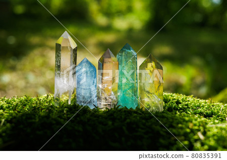 Gemstones minerals on mysterious nature background. Magic Rock for Crystal Ritual, healing spiritual practice. Gemstones minerals on mysterious nature background. Magic Rock for Crystal Ritual, healing spiritual practice. 80835391