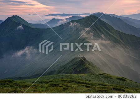 Tanigawa mountain range main ridgeline and sea of clouds at dusk Tanigawa mountain range main ridgeline and sea of clouds at dusk 80839262