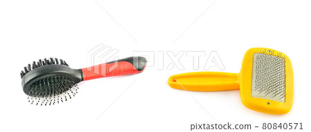 combs for grooming pet hair isolated on white background. Wide photo. combs for grooming pet hair isolated on white background. Wide photo. 80840571