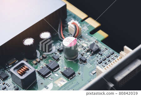 Electrolytic capacitor on electronic circuit board 80842019