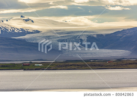 Panoramic picture of Vatnajoekull glacier tongues from Hoefn village Panoramic picture of Vatnajoekull glacier tongues from Hoefn village 80842863