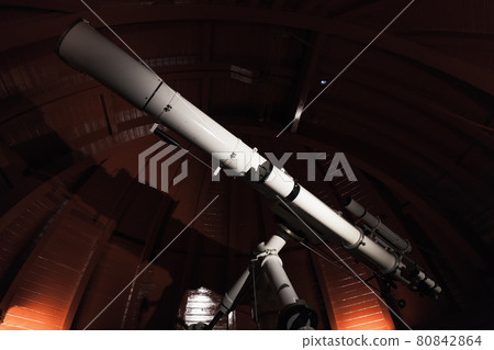 Professional telescope is in an observatory Professional telescope is in an observatory 80842864