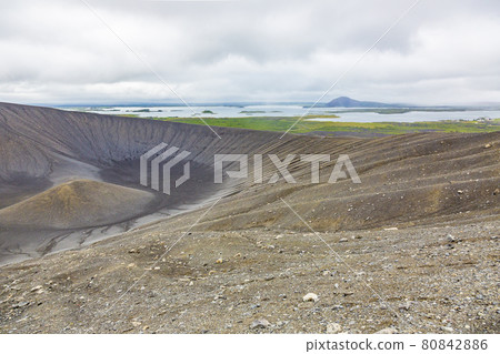 View from Hverfjall volcano summit over the Myvatn lakes and volcano crater during daytime View from Hverfjall volcano summit over the Myvatn lakes and volcano crater during daytime 80842886