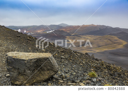 View from the Hverfjall volcano summit to the Hverir geothermal area on Iceland during daytime 80842888
