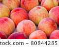 Ripe freshly picked peaches 80844285