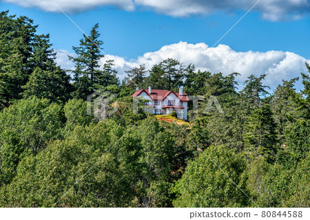 Lonely old residential house on the top of the hill 80844588