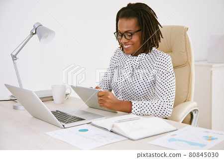 Cheerful Young Female Entrepreneur Cheerful Young Female Entrepreneur 80845030