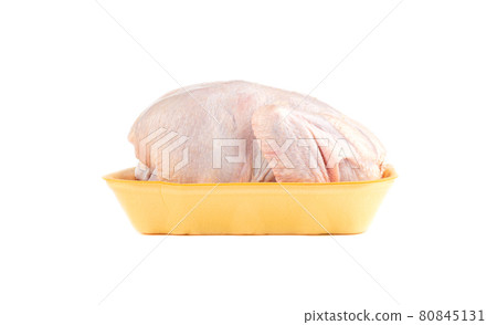 Whole fresh chicken in a plastic tray isolated on a white background. Whole fresh chicken in a plastic tray isolated on a white background. 80845131