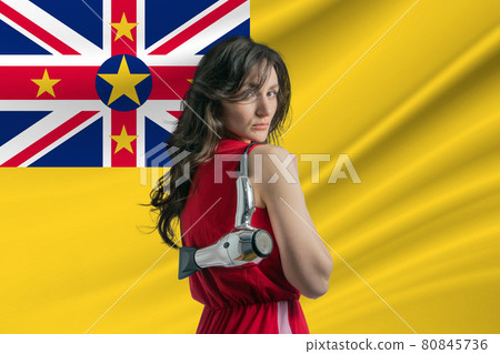 Beauty industry in Niue. Happy female hairdresser holding hairdryer against Niue flag background Beauty industry in Niue. Happy female hairdresser holding hairdryer against Niue flag background 80845736