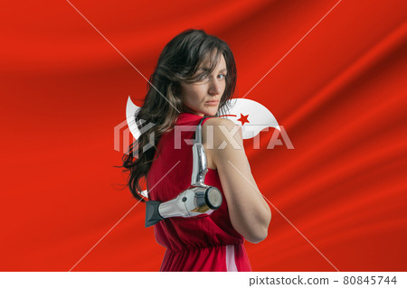 Beauty industry in Hong Kong. Happy female hairdresser holding hairdryer against Hong Kong flag background 80845744