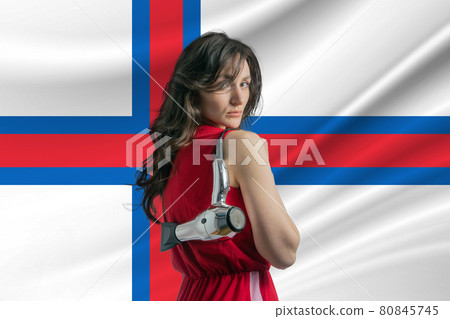 Beauty industry in Faroe Islands. Happy female hairdresser holding hairdryer against Faroe Islands flag background Beauty industry in Faroe Islands. Happy female hairdresser holding hairdryer against Faroe Islands flag background 80845745